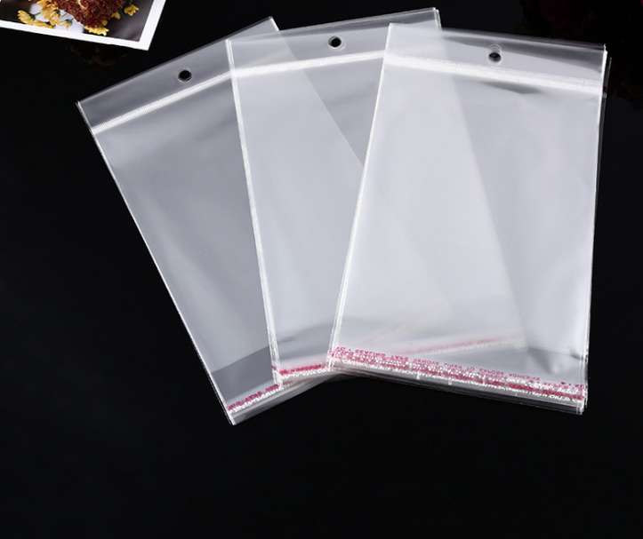 Factory stock of universal opp bags, self-adhesive white pearlescent film card head bags, transparent card head bags, colored card head round hole aircraft jewelry packaging bags, transparent plastic bags, hanging card bags, 1000 pieces per bundle detail image 13