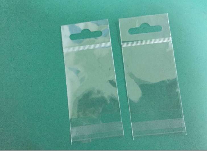 Factory stock of universal opp bags, self-adhesive white pearlescent film card head bags, transparent card head bags, colored card head round hole aircraft jewelry packaging bags, transparent plastic bags, hanging card bags, 1000 pieces per bundle detail image 3