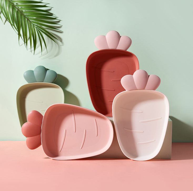 Cute plastic fruit plate with radish