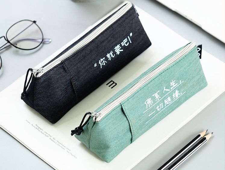 Canvas pen bag Simple large capacity creative personality Student stationery bag Triangle zipper pencil case roll pen bag
