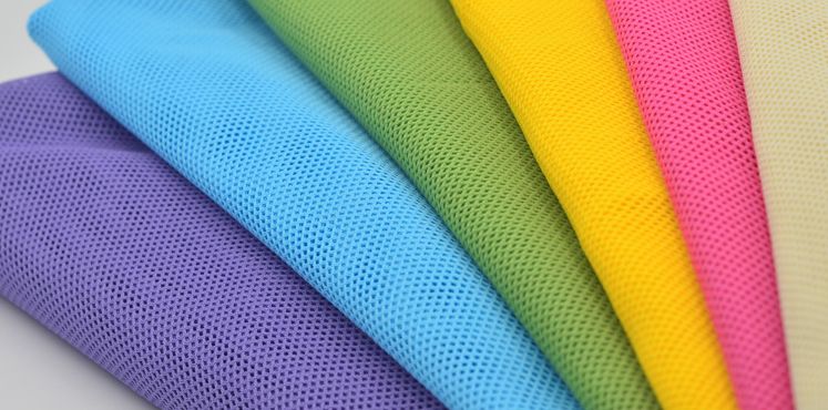 全涤低弹经编网眼布 2X2网眼布 运动服校服里料 网布面料现货细节图