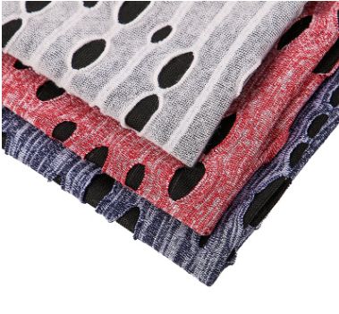 Tie-dyed double-sided water-soluble silk perforated beggar's smiling fabric is a popular knitted fashion women's clothing fabric