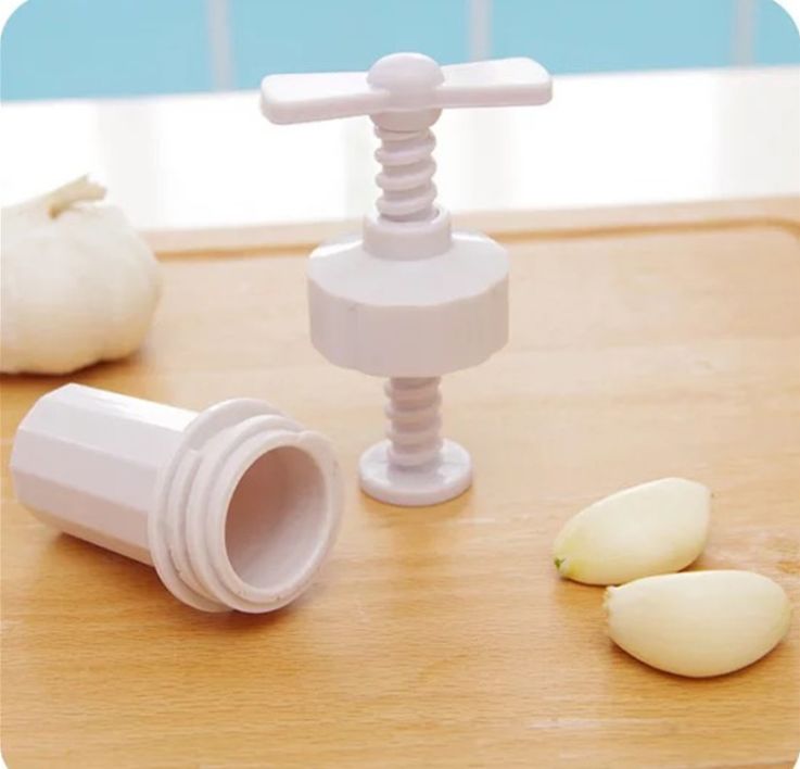 Creative Spinning garlic puree Garlic Press Garlic Press Garlic Twist Plastic kitchen gadgets