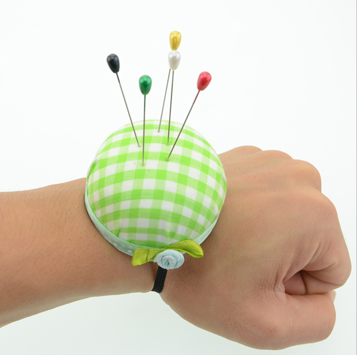 A portable wrist DIY tomato needle inserter with checkered cloth for manual needle insertion detail image 1