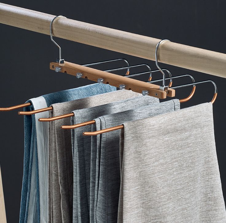 Multifunctional trouser rack Multi-layer home trouser wardrobe seamless expansion folding trouser clip Solid wood magic white hangers