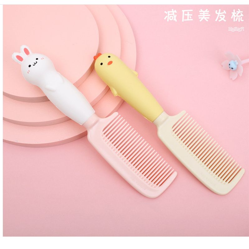Cartoon three-dimensional handle hair comb, foam rubber pressure-relieving hair straightening comb, portable plastic comb for students and women at home Specification image