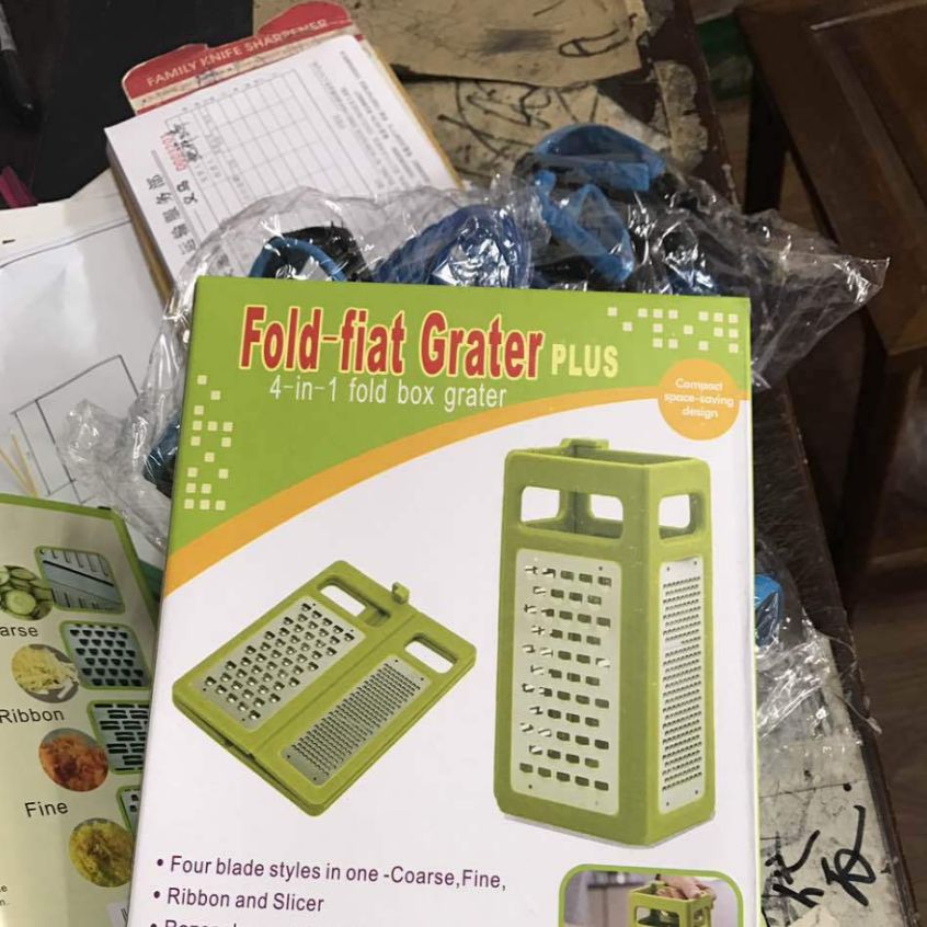 Planer knife slicer Folding four dimensional multi-functional vegetable slicer similar to a peeler