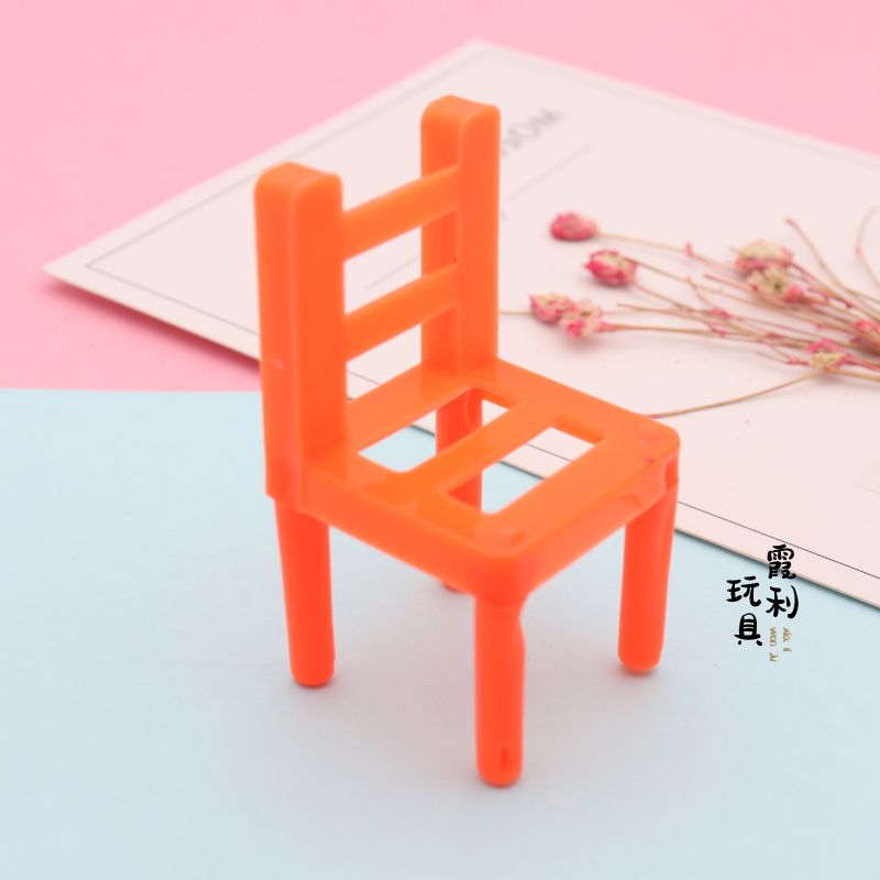 A plastic toy with a small chair for playing house as a gift Item Picture