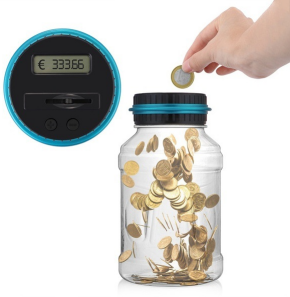 Small piggy bank: US dollars, euros, pounds detail image 1