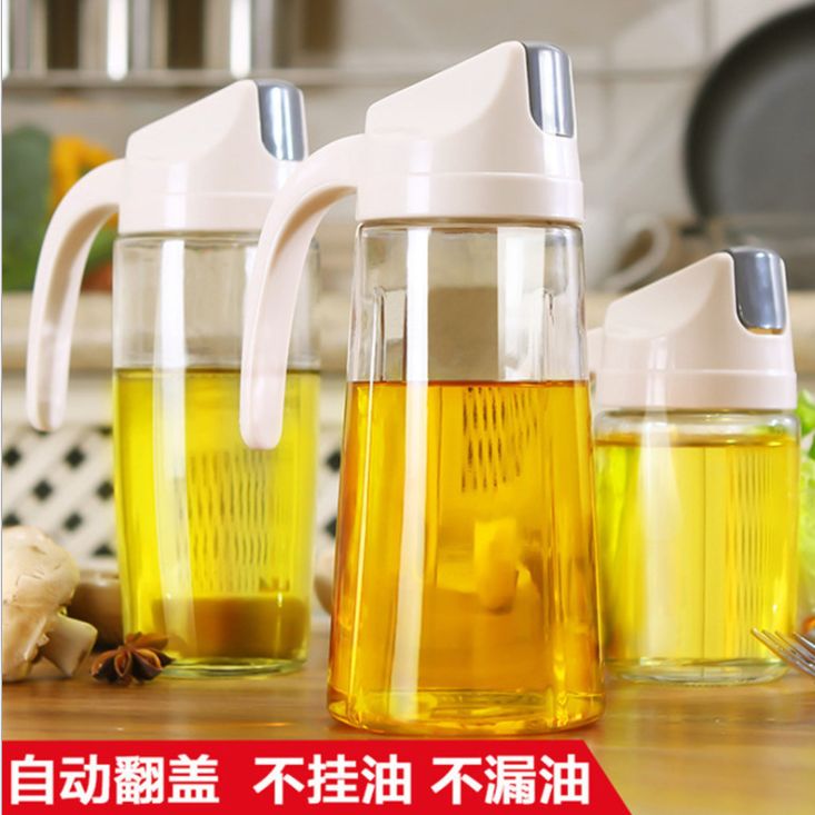 The glass dust-proof and leak-proof oil can automatically open and flip the lid