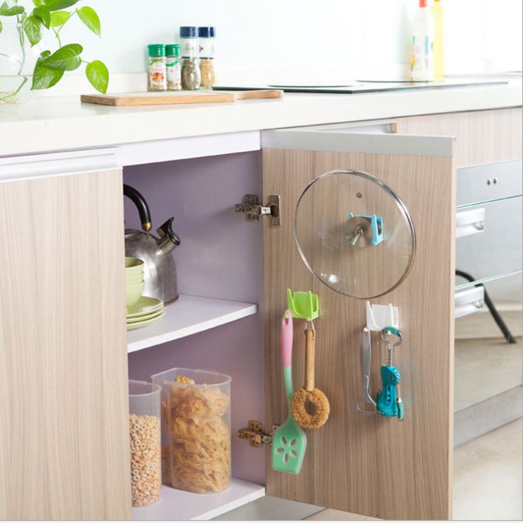 Kitchen wall lid holder