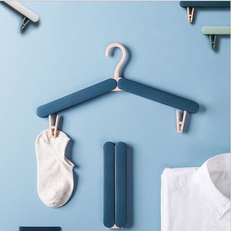 Multifunctional travel folding hanger for storage drying hanger