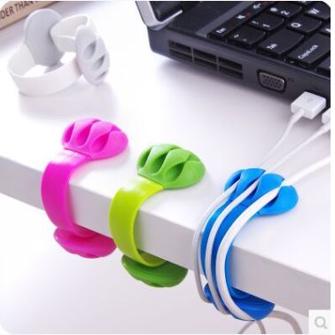Desk plug wire finishing clamp