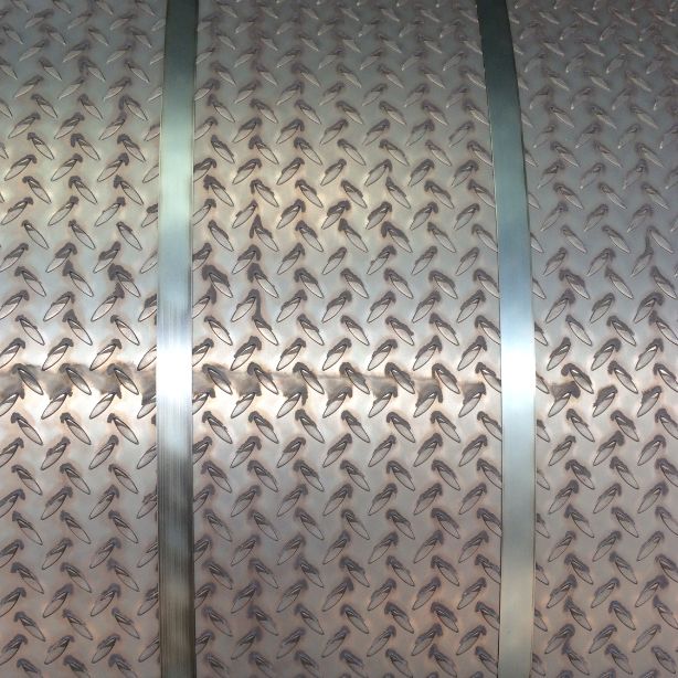 Patterned steel plate, embossed steel plate, rolled embossed steel plate, steel coil, steel plate