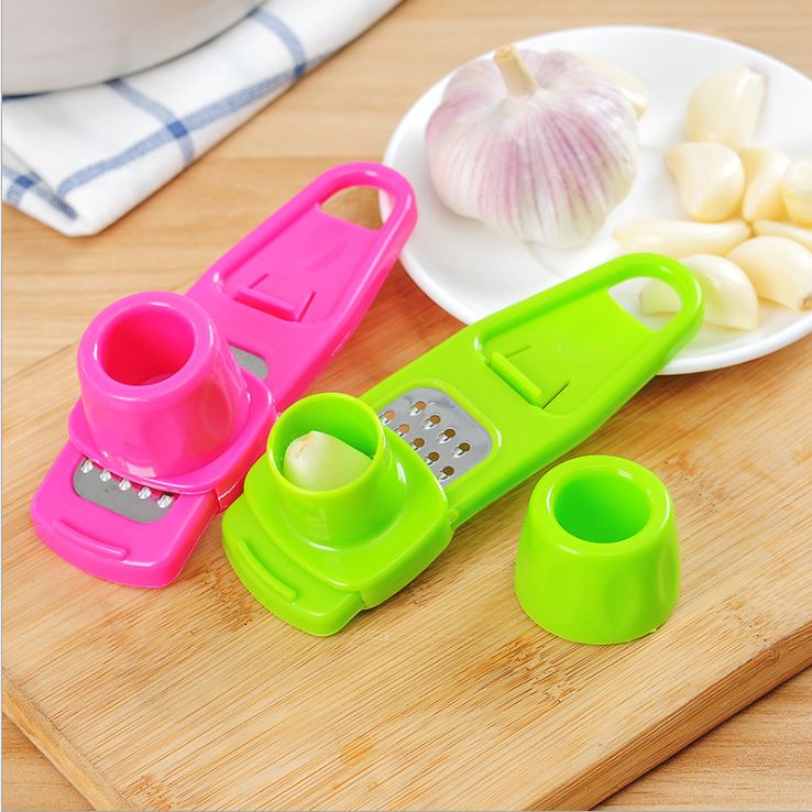 Yi multi-functional ginger grinder, garlic cutter and garlic press