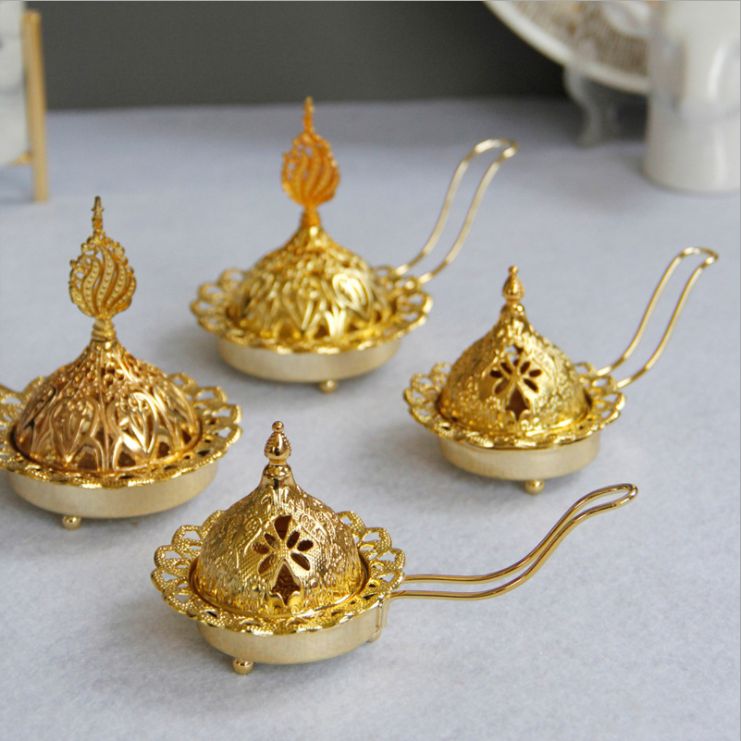 Hand-held incense burner candle holder