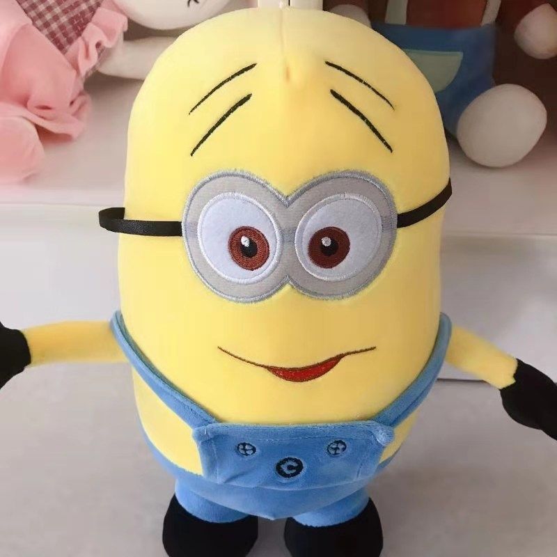 Factory direct sales of Minion plush toys from Baohua Toys Store. Lazy bed cartoon dolls, cute sleeping cushions, pillow decorations, plush doll styles