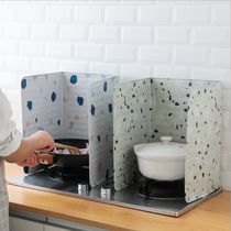 Home cooktop oil splash damper