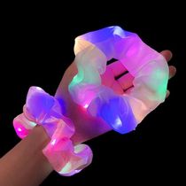 A glowing Instagram scrunchie