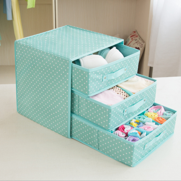 A raised drawer-type storage box for socks, underwear and undergarments detail image 1