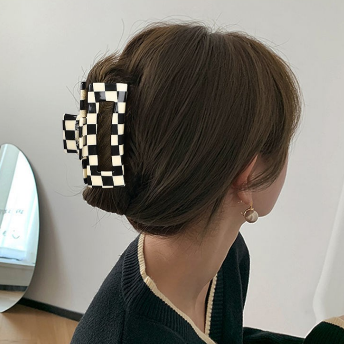 A popular checkerboard square hollowed-out gripper
