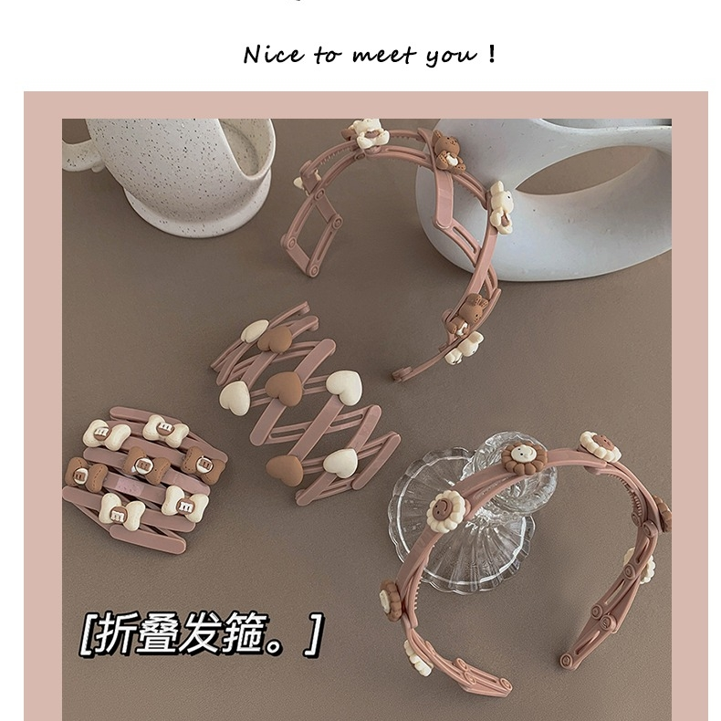 A new style of fashionable headwear featuring a stretchable cartoon hairband. It is a decorative headwear for daily hair tying and fixation for girls, as well as a hair clip