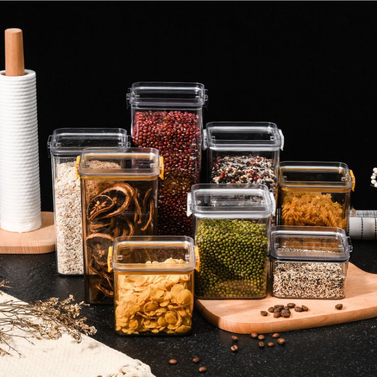Clear plastic food-grade storage jars for household use