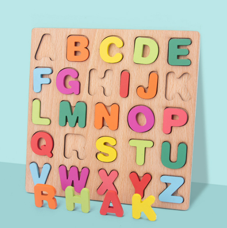 Wooden toy letter jigsaw puzzle detail image 1