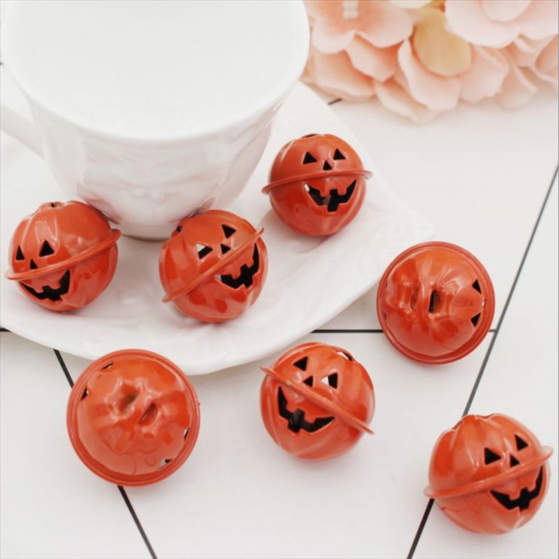 Pumpkin lacquered ghost face bell 1
