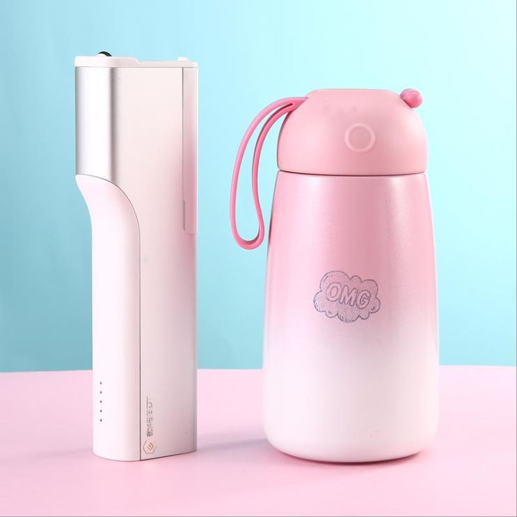 PrintPen A hand-held printer with a spray pen for tattooing