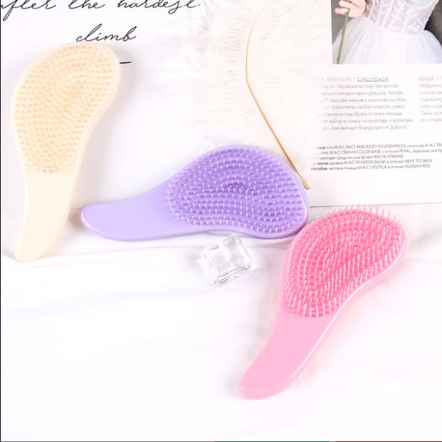Portable scalp friendly soft tooth hair comb