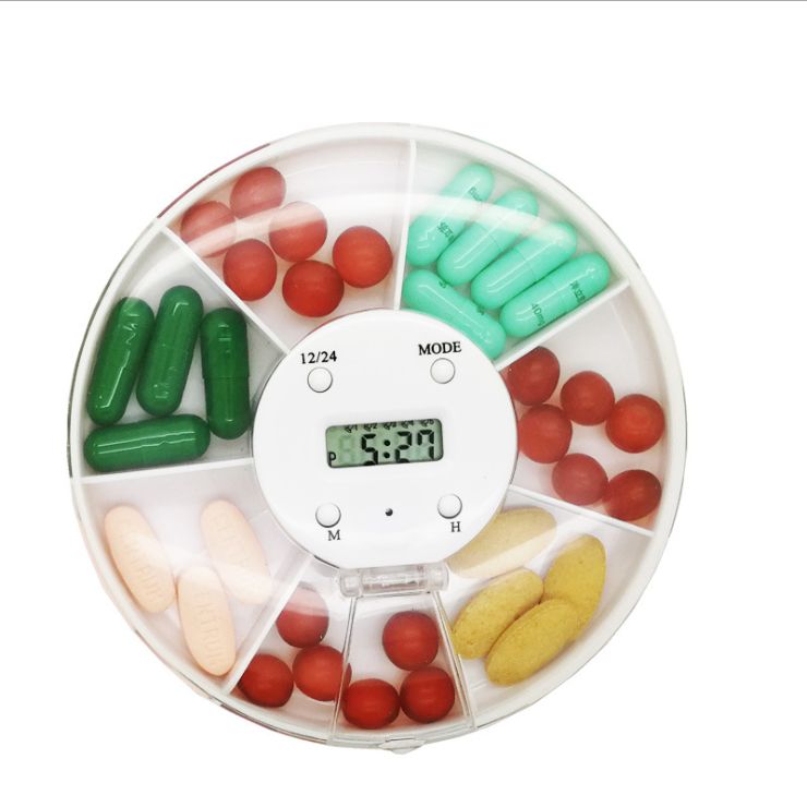 Portable round round seven boxes to remind the storage of intelligent electronic medicine box