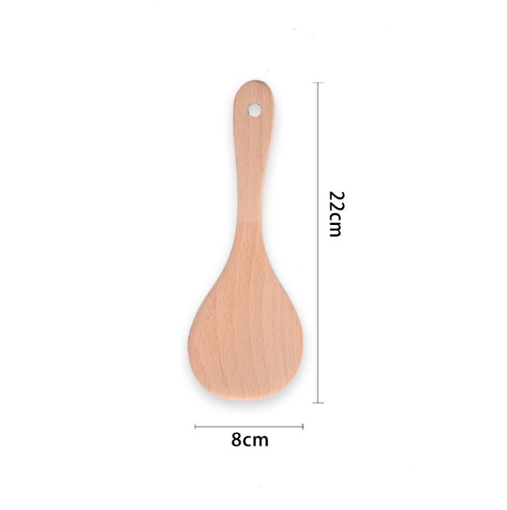 A wooden rice spoon details Picture