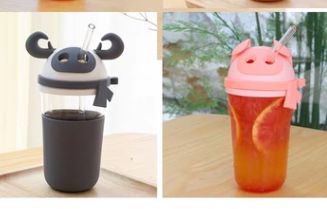 Glass cup with straw