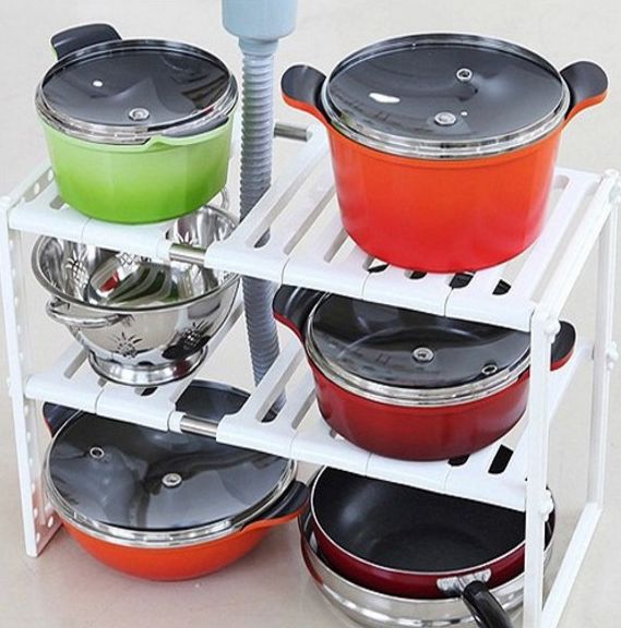 Stainless steel retractable lower sink shelf