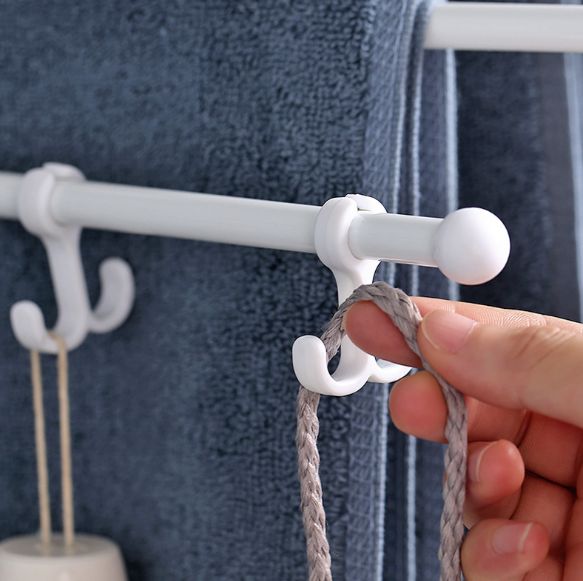 Black, simple, foldable, rotating and movable towel rack without holes Application Scenario