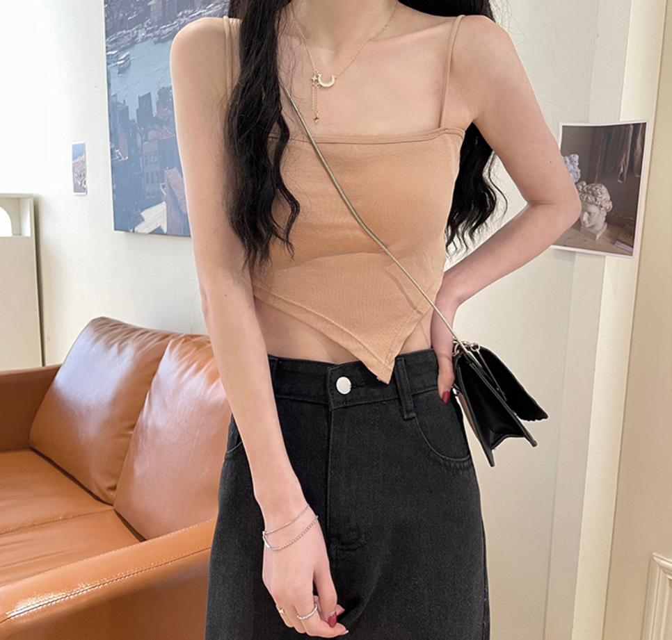 A short white halter top is worn inside as a women's anti-exposure off-the-shoulder bra with a chest pad for autumn Application Scenario