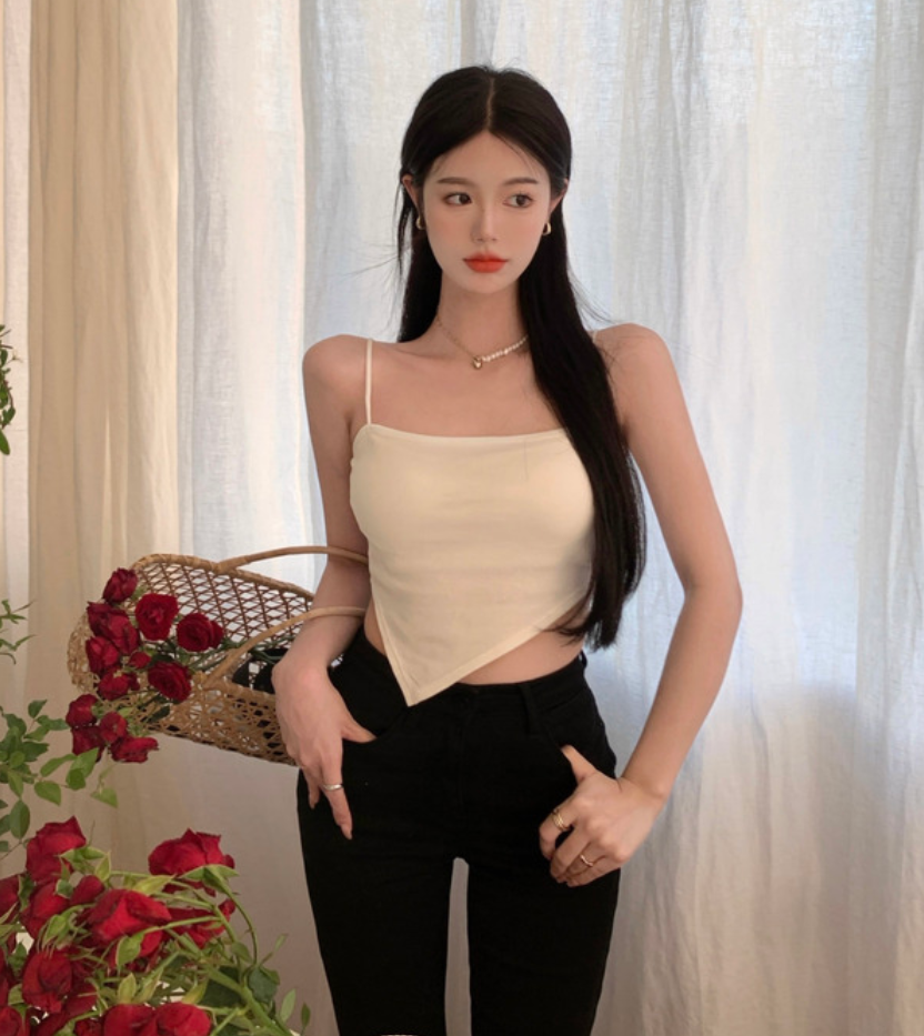 The strappy vest is a unique and irregular design for women in spring and summer, with a pure and sensual hot girl style. It can be worn as an outer layer with a base layer of a small top details Picture