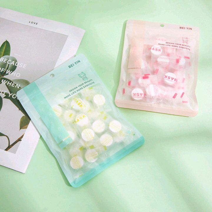 Bag of 30 candy granules disposable compression mask paper facial moisturizing granules