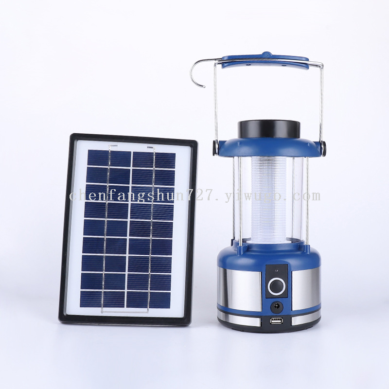 A silver spray-painted 3-watt solar panel with 36 leds and a USB interface, multi-functional camping lamp that can charge mobile phones