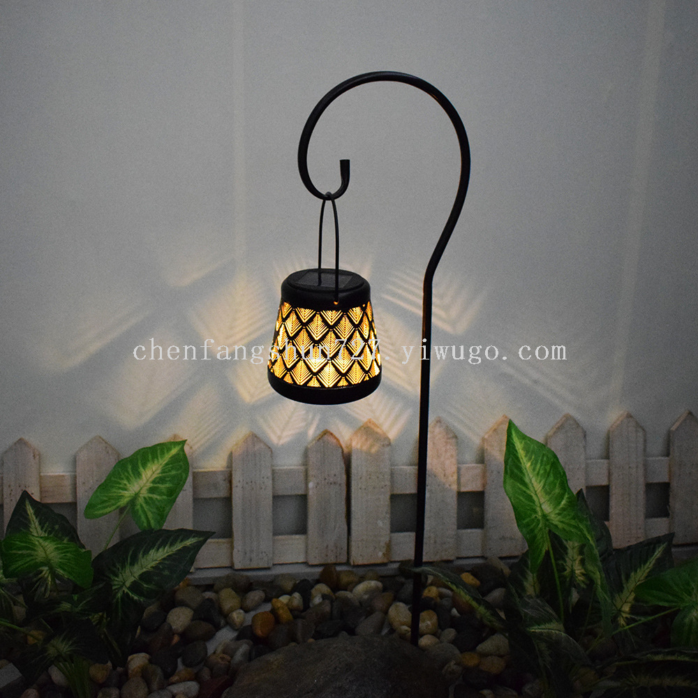 New modern courtyard ground insert lawn lamp, decorative ironwork hollowed-out solar lantern, iron can projection hanging lamp