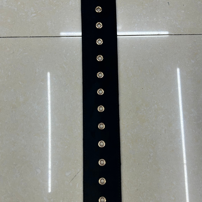 A fashionable and versatile black woven wide belt with elastic waistband is worn over a waist belt for summer dress dresses details Picture