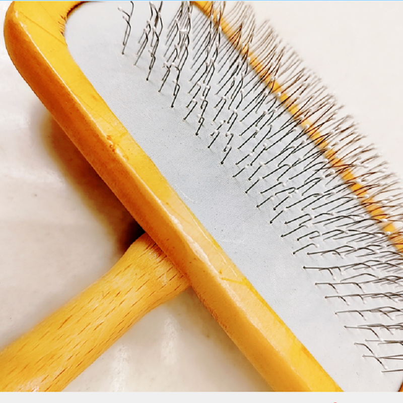 Pet grooming and cleaning products for cats, dogs, and pets - wooden handle combs Application Scenario