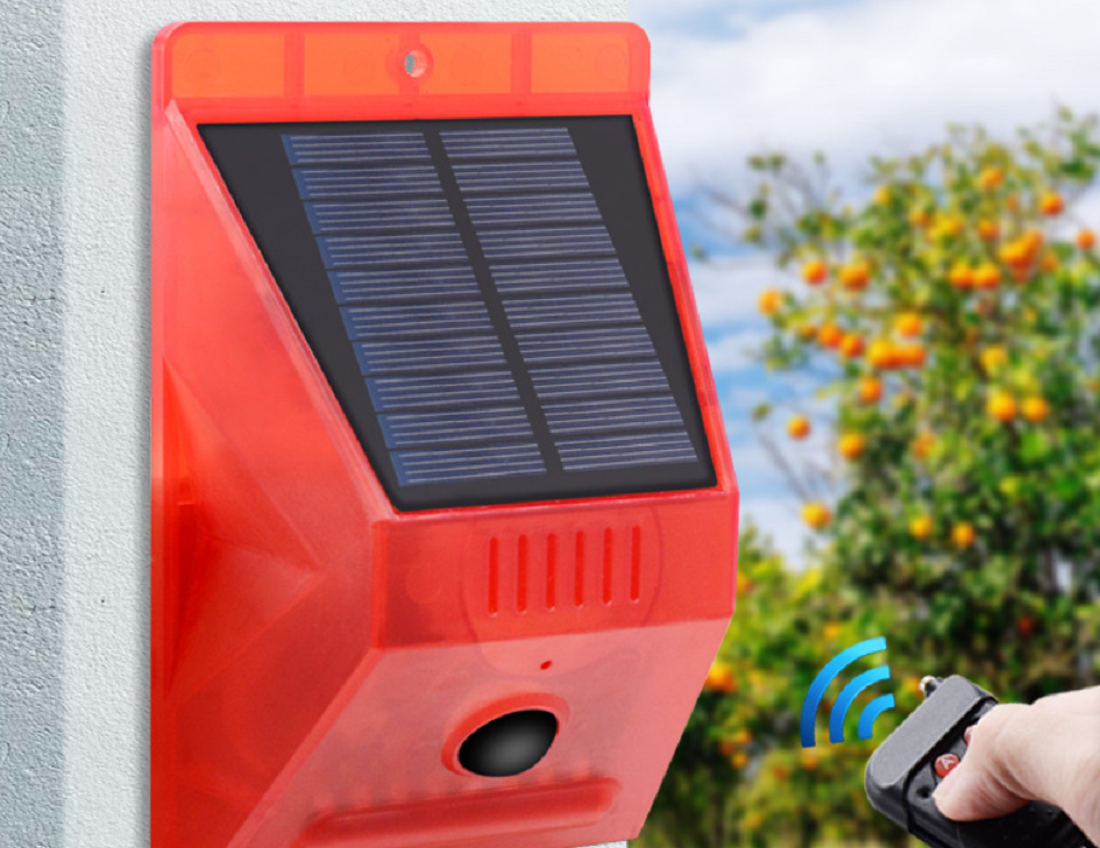 Solar-powered outdoor human body infrared sensor alarm light, orchard sound and light household alarm for anti-theft