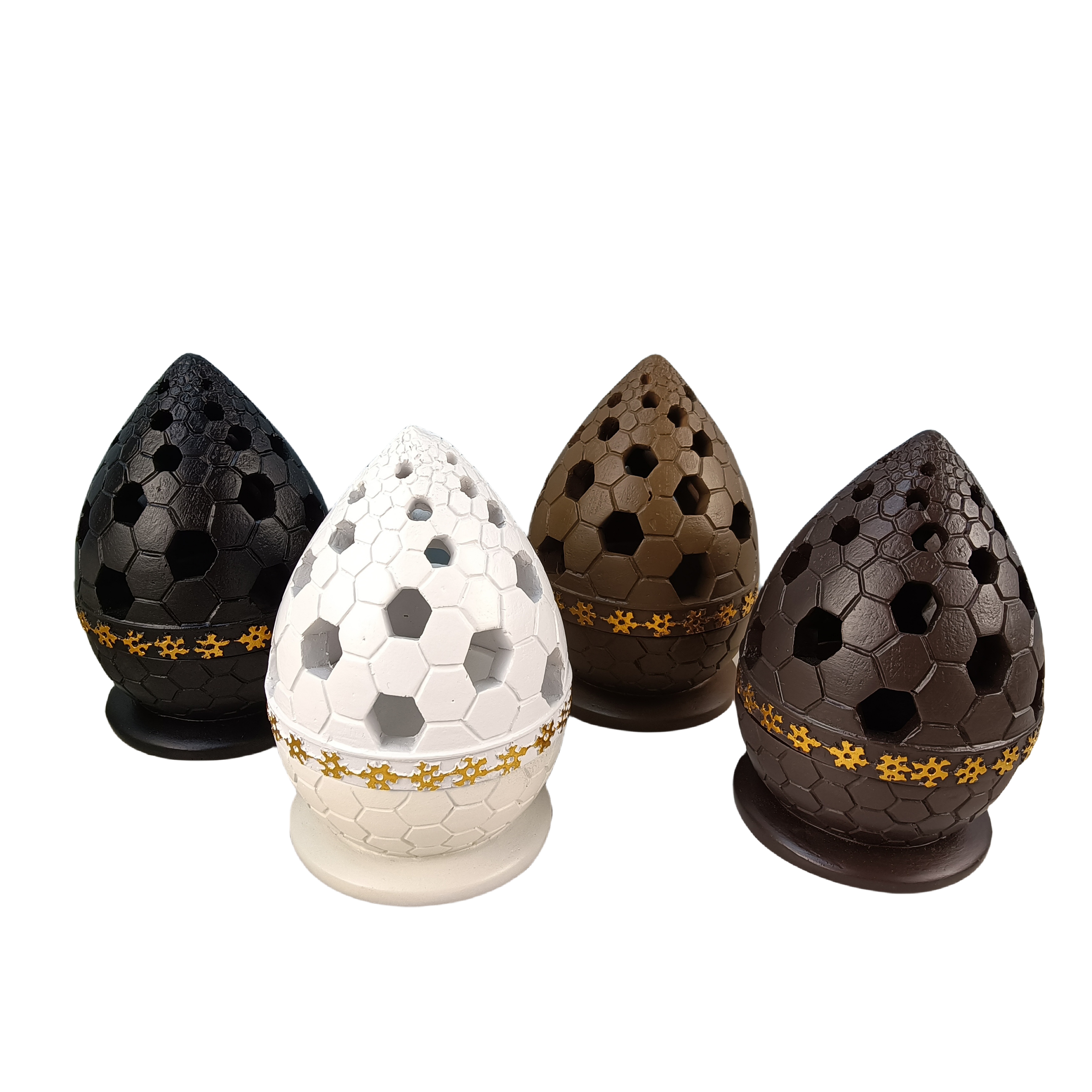 Artisan crafting resin incense burner in workshop