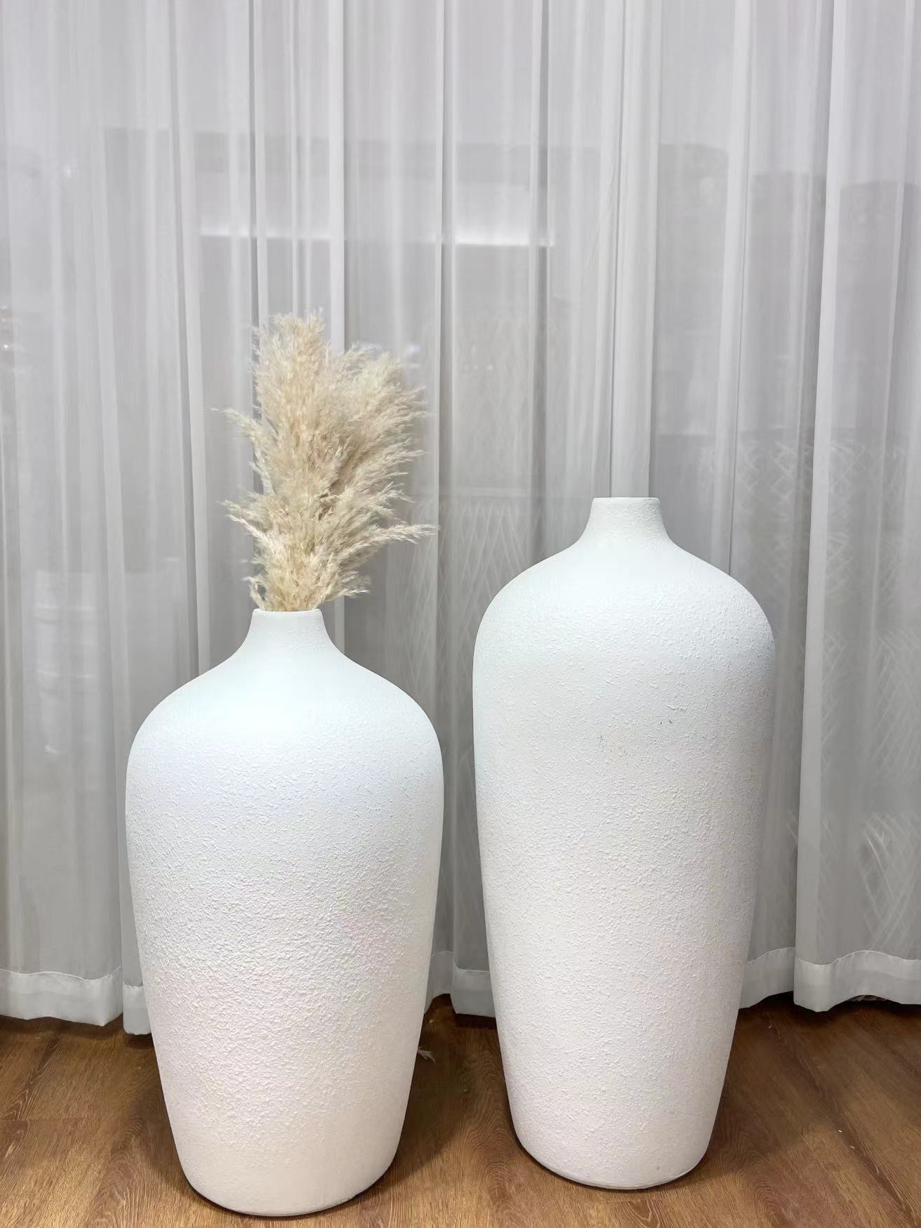 A large white magnesium oxide vase in Nordic style