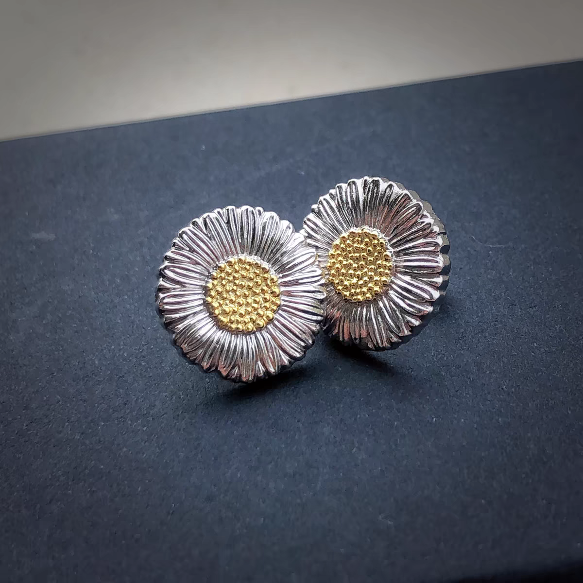 A pair of the latest Daisy earrings details Picture