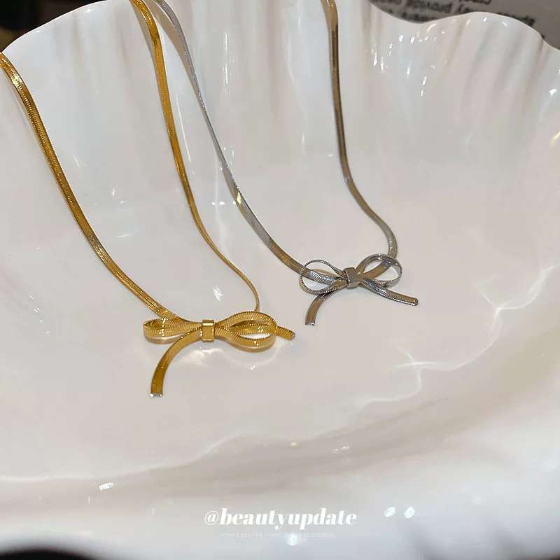 欧美风格银饰珍珠项链 珍珠饰品项饰 优雅时尚女士首饰 简约大方礼物精选 蝴蝶结钛钢项链 梦菲妮