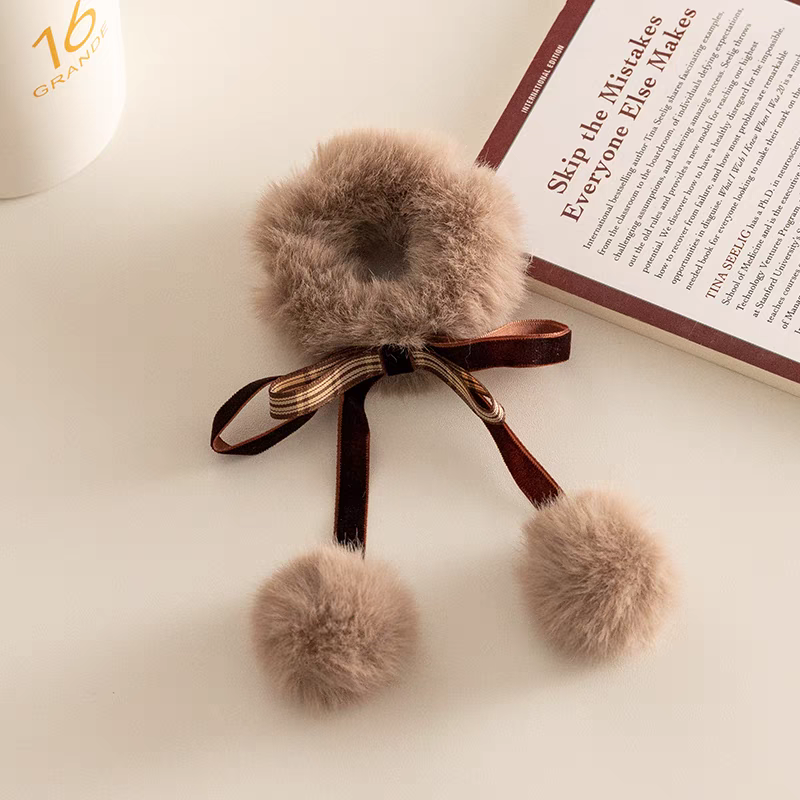 The new Japanese autumn and winter style coffee-colored plush hair band, elegant and fairy-like fur ball bow headwear, and bun hair tie detail image 5