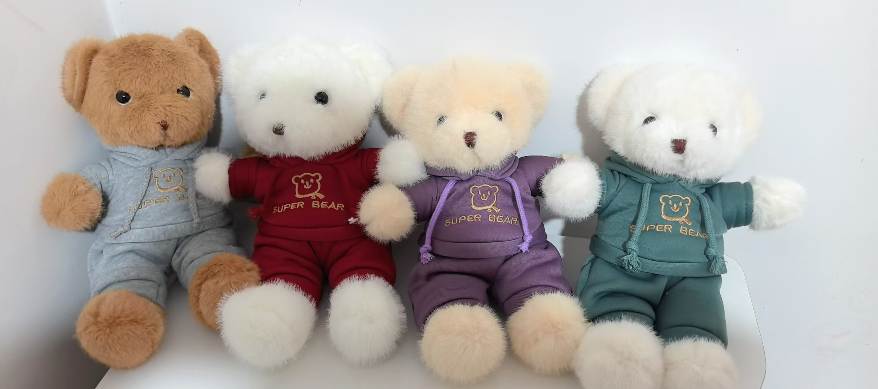 Leather shell toys, plush toys, doll factory direct shipment wholesale, leather shell fabric dolls, toys, little bears, leather shell toys, four-color little bears Specification image